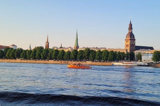 Riga Canal and Daugava Boat Tour with Welcome Drink & Audio Guide - Why a short boat ride works well in Riga