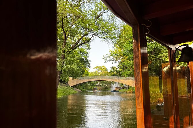Riga Canal and Daugava Boat Tour with Welcome Drink & Audio Guide - Riga Central Market and the city’s working side