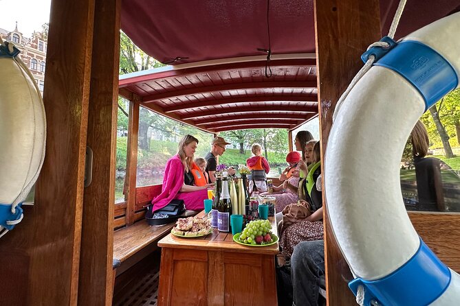 Riga: Evening or Sunset Boat Tour with Drink and Audio Guide - Riga from the water, from canals to open river