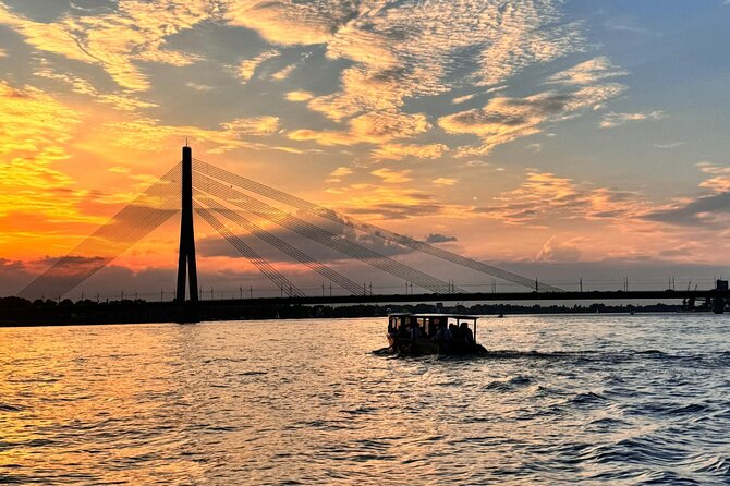 Riga: Evening or Sunset Boat Tour with Drink and Audio Guide - Comfort, weather, and family practicalities